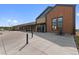 Exterior view of the modern Aurora YMCA building, featuring wood and stone facade and ample parking at 6310 S Ider St, Aurora, CO 80016