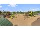 A colorful playground with slides, climbing structures, and soft landing for safe and fun outdoor play at 6310 S Ider St, Aurora, CO 80016