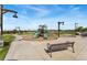 A playground with slides, benches, and well-maintained sidewalks, offering recreational space at 6310 S Ider St, Aurora, CO 80016