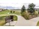 Picturesque community park features walking path and park bench at 7814 Grady Cir, Castle Rock, CO 80108
