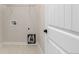 Practical laundry area features shelving and hookups for laundry appliances at 7814 Grady Cir, Castle Rock, CO 80108
