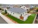 Aerial shot of backyard featuring artificial lawn, a deck, fenced perimeter and manicured yard at 7814 Grady Cir, Castle Rock, CO 80108