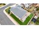Aerial view of home's backyard, showcasing a deck, artificial lawn, fence, and well-maintained landscaping at 7814 Grady Cir, Castle Rock, CO 80108