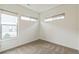 Empty bedroom with neutral-toned carpeting at 2692 Front View Cres, Denver, CO 80211