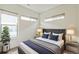 Bright bedroom with a double bed and modern decor at 2692 Front View Cres, Denver, CO 80211