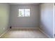 Bedroom with neutral walls and carpet, plus a window offers ample natural light at 1099 Wheeling St, Aurora, CO 80011