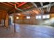 Spacious unfinished basement featuring concrete walls and floor, and exposed beams at 288 Dover Ct, Broomfield, CO 80020