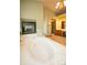 Bathroom featuring a soaking tub, a built-in fireplace, and a vanity with cabinets at 288 Dover Ct, Broomfield, CO 80020