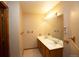 Well-lit bathroom with a double sink vanity and a large mirror, offering ample space at 288 Dover Ct, Broomfield, CO 80020