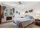 Cozy bedroom featuring a large window, soft carpet, and stylish decor at 3355 Hickok Pl, Boulder, CO 80301