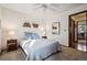 Relaxing bedroom with a ceiling fan, plush carpet, and natural lighting at 3355 Hickok Pl, Boulder, CO 80301