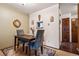 The dining room includes an ornate mirror and rustic wooden table at 3355 Hickok Pl, Boulder, CO 80301