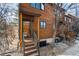 Charming exterior elevation of home with wooden siding, covered porch, and well-maintained landscaping at 3355 Hickok Pl, Boulder, CO 80301