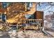 Back of unit showing outdoor deck with stairs leading to lower area, wood siding and outdoor entry at 3355 Hickok Pl, Boulder, CO 80301