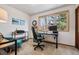 Bright home office features a large window, neutral walls, and stylish decor, perfect for a productive workspace at 3355 Hickok Pl, Boulder, CO 80301