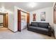 This living room includes an open bi-fold closet with modern laundry appliances, creating a convenient laundry space at 3355 Hickok Pl, Boulder, CO 80301