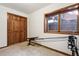 This functional room includes a workout machine, natural light, and a spacious closet, perfect for home fitness at 3355 Hickok Pl, Boulder, CO 80301