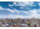 Stunning aerial view showcasing city skyline and neighborhood at 460 E Fremont Pl # 301, Littleton, CO 80122