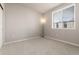 Spacious bedroom with neutral walls and carpet flooring at 460 E Fremont Pl # 301, Littleton, CO 80122