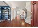 Grand foyer featuring hardwood floors, curved staircase, and elegant decor at 344 Saint Paul St, Denver, CO 80206