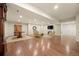 A finished basement features hardwood floors, recessed lighting, entertainment area, and walkout access at 344 Saint Paul St, Denver, CO 80206
