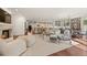 Open living space with a fireplace, kitchen, and dining area at 344 Saint Paul St, Denver, CO 80206