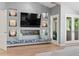 Cozy sitting room with fireplace, television and decorative accents at 344 Saint Paul St, Denver, CO 80206
