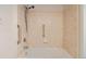 Accessible bathroom featuring a tiled shower-tub combination at 875 E 78Th Ave # 9-2, Denver, CO 80229
