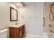 Accessible bathroom with shower tub combination and vanity at 875 E 78Th Ave # 9-2, Denver, CO 80229
