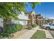 A well-maintained condo building with brick accents and parking available at 875 E 78Th Ave # 9-2, Denver, CO 80229