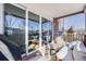 Comfortable balcony with outdoor seating and neighborhood views at 111 S Monroe St # B203, Denver, CO 80209