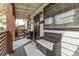Cozy front porch with comfortable seating and great natural light at 3464 S Downing St, Englewood, CO 80113