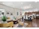 Open-concept living space flows seamlessly from the living room to the dining area and kitchen at 6240 N Dayton Ct, Denver, CO 80238