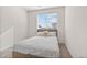 Bedroom with a window and carpet flooring at 5173 Vivian St, Wheat Ridge, CO 80033
