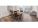 Dining area with hardwood floors offers a great space for entertaining Gathering and friends at 5173 Vivian St, Wheat Ridge, CO 80033