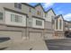 Modern exterior townhome with attached garage and neutral colors at 5173 Vivian St, Wheat Ridge, CO 80033