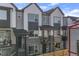Charming townhouse featuring a mix of modern materials with covered porches for outdoor enjoyment at 5173 Vivian St, Wheat Ridge, CO 80033
