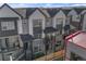 Modern exterior townhome with multiple stories and balconies at 5173 Vivian St, Wheat Ridge, CO 80033