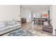 Inviting living room features hardwood floors and neutral décor, creating a warm and welcoming atmosphere at 5173 Vivian St, Wheat Ridge, CO 80033