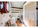 Cozy bathroom featuring a tiled shower, unique flooring, and natural light at 306 E Cannon St, Lafayette, CO 80026