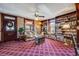 Cozy living room featuring vintage details, built-in bookshelves, and ample natural light at 306 E Cannon St, Lafayette, CO 80026