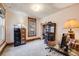 Home office featuring carpeted floors, a vintage desk, and natural light at 306 E Cannon St, Lafayette, CO 80026