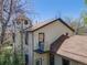 Exterior shot of a home showcasing unique architecture and an external AC unit at 306 E Cannon St, Lafayette, CO 80026