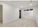 Spacious basement room with carpeted floor and window at 5577 E Links Cir, Centennial, CO 80122