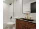 Contemporary bathroom with black sink and gold faucet at 5577 E Links Cir, Centennial, CO 80122