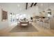 Bright dining area with wood floors and modern light fixtures at 5577 E Links Cir, Centennial, CO 80122