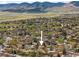 Stunning aerial view showcasing the neighborhood and surrounding landscape at 12662 W Asbury Pl, Lakewood, CO 80228