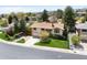Beautiful home with well-kept lawn, mature trees, and a spacious driveway at 12662 W Asbury Pl, Lakewood, CO 80228