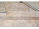 Bathroom walk-in shower with glass door and decorative tile work at 12662 W Asbury Pl, Lakewood, CO 80228