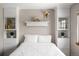Cozy bedroom with custom built-in shelving and storage, perfect for maximizing space at 12662 W Asbury Pl, Lakewood, CO 80228
